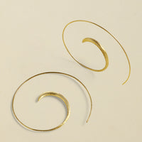 Close-up of Gold-Coated Handmade Silver Creoles