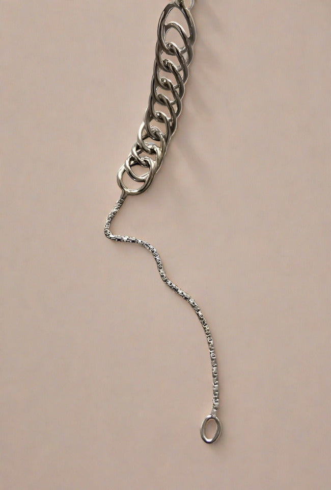 Close-up of a sterling silver chain bracelet, featuring a simple and elegant design with a lightweight feel, perfect for everyday wear