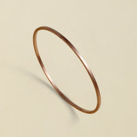 Handcrafted bronze bangle with bronze coloring