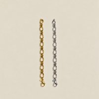 2 Bracciali a Catena di RIMA con placcatura in oro giallo e bianco creando un effetto lucente.
