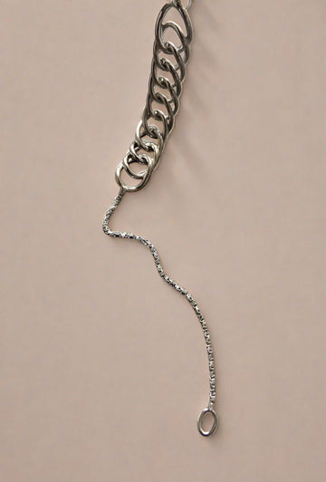 Close-up of a sterling silver chain bracelet, featuring a simple and elegant design with a lightweight feel, perfect for everyday wear