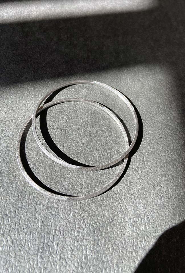 Handcrafted bronze bangle with silver coating