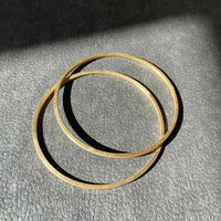 Handcrafted bronze bangle with gold coating